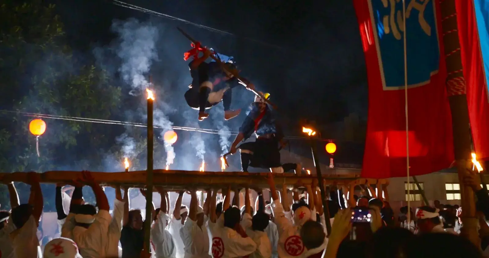 People carrying a festival stage during Hounensai on Ishigaki Island