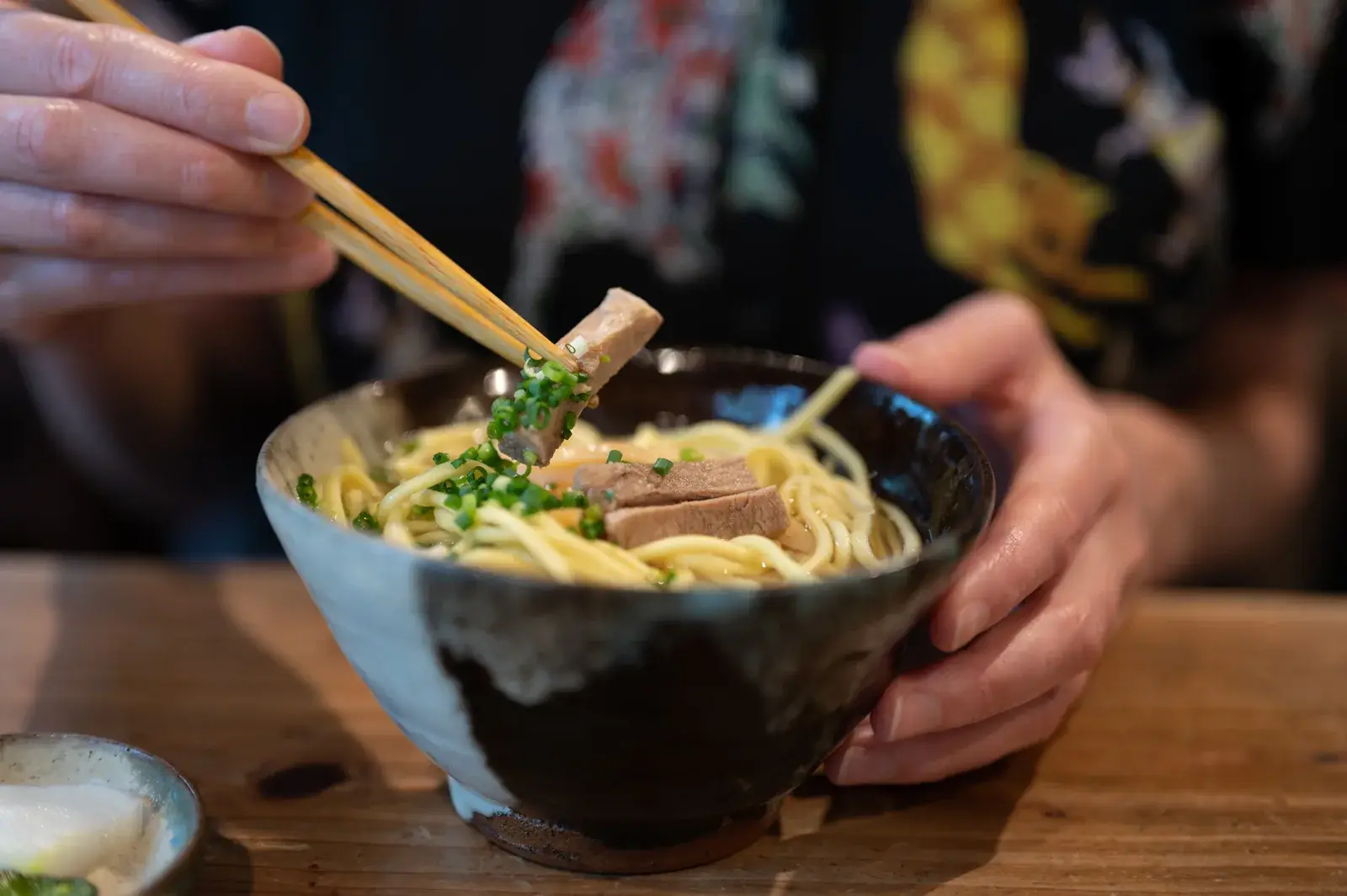 Eating a bowl of Yaeyama soba in Ishigaki City