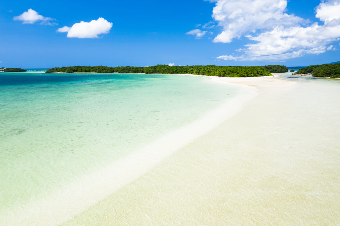 Wide shot of Kabira Bay with turquoise waters Kabira Bay, Ishigaki Island’s most famous beach with turquoise waters and white sand.
