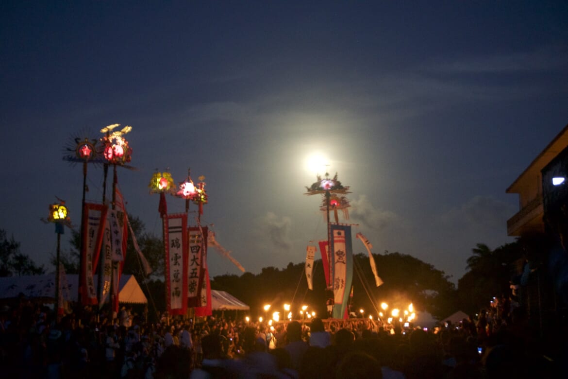 Sunset and moonrise with local islanders at Hounensai, a summer festival in Ishigaki Island, Okinawa.